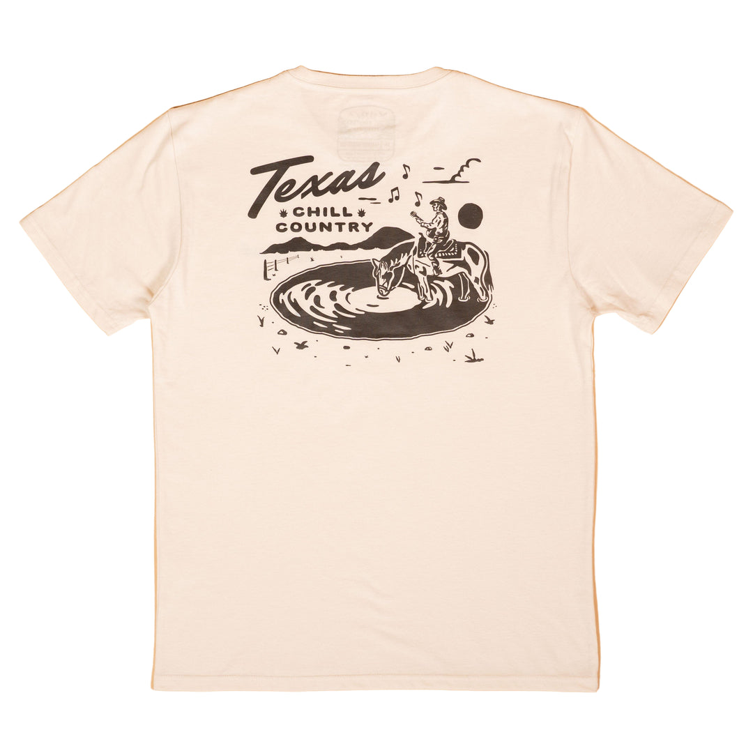 White t-shirt with black graphic design on a beige background